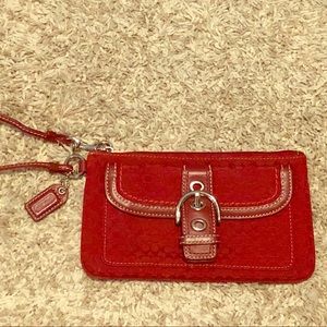 Red jacquard and leather Coach wristlet